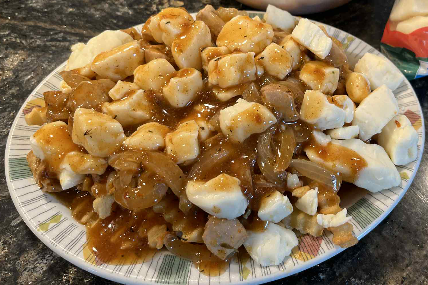 RGFC – Cajun Chicken Poutine – Dish Cajun Chicken Poutine - dish fully assembled